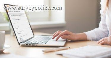Woman taking diary survey on her laptop