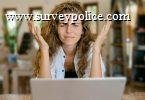 Survey taker sitting in front of computer
